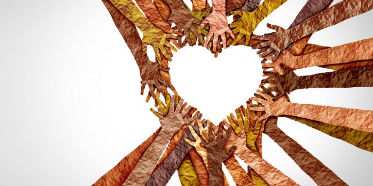 hands coming together in the shape of a heart